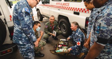 Flight Lieutenant Troy Gersbach, left, and Leading Aircraftwoman Amy Wardley alongside Malaysian Army and Air Force medical personnel during Exercise Elangaroo 22 in Malaysia. Story by Flight Lieutenant Bronwyn Marchant. Photo by Leading Aircraftman Adam Abela.