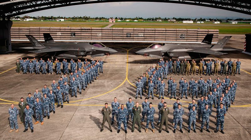 Personnel from 75 Squadron in front of two F-35As at RMAF Base Butterworth, Malaysia. Photo by Leading Aircraftman Adam Abela.