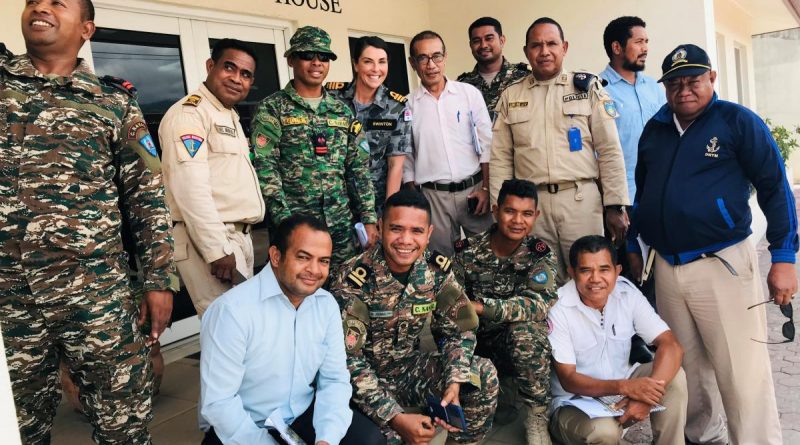 Partners from Timor-Leste government agencies with ADF military legal officer instructors at the front of Sparrow Force House in Dili, Timor-Leste.