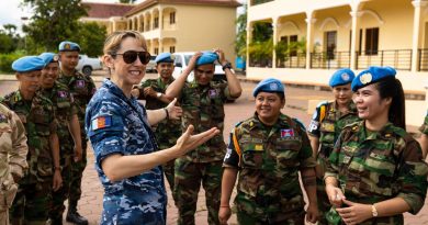 RAAF officer Squadron Leader Karyn Ey conducts an ice-breaker activity with personnel from the Royal Cambodian Armed Forces during an ADF led workshop in Phnom Penh, Cambodia. Story by Flying Officer Lily Lancaster. Photo by Corporal Brandon Grey.