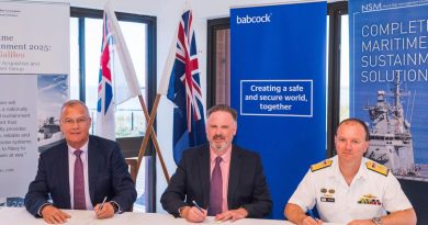 Babcock Australasia’s CEO David Ruff, left, and Managing Director – Defence Andy Davis with Director General Major Surface Ships Commodore Brad Smith during the contract signing ceremony in Western Australia. Photo by Simon Casson.