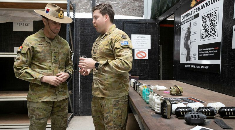 Australian Army soldier Corporal Jake Bostock talks with Chief of Army, Lieutenant General Simon Stuart, AO, DSC. Story by Captain Cody Tsaousis. Photo by Sergeant Tristan Kennedy.