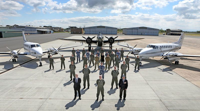 32 Squadron and Squadron Leader (retd) Ted McConchie with a 100 Squadron Lockheed Hudson aircraft and 32 Squadron B350 King Air aircraft. Story by Flying Officer Ellis Mitchell. Photo by Petty Officer Richard Prideaux.