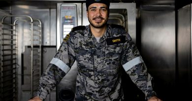 Seaman Maritime Logistics Chef William Smith in the galley on board HMAS Adelaide. Story by Staff Sergeant (USMC) Antonio De la Fuente and Lieutenant Amy Johnson. Photo by Leading Seaman Nadav Harel.