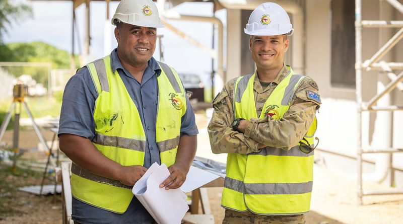 Australian Army engineer Captain Lachlan Attard, right, with site supervisor Mr John Tokataake at the Vanuatu Police Force's Cook Barracks redevelopment site in Port Vila. Story by Captain Dan Glover. Photo by Corporal Jonathan Goedhart.