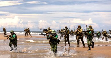 Soldiers from the ADF and Royal Brunei Armed Forces come to shore during a joint military exercise. Story by Flying Officer Brent Moloney. Photo by Leading Seaman Jarryd Capper.