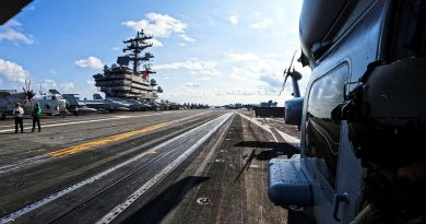 Leading Seaman Aircrewman Jake Williams looks out from HMAS Hobart's embarked MH-60R helicopter ‘Carnage’ during a cross-deck onto US Navy Aircraft Carrier, USS Ronald Reagan. Story by Lieutenant Brendan Trembath. Photo by Able Seaman Emily Johnson.