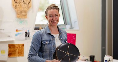 ADF ARRTS Program participant FLTLT Tess O'Brien with her art in the visual arts studio at the University of Canberra's Inspire Centre. Story by Flight Lieutenant Thomas McCoy. Photo by CPL Olivia Cameron.