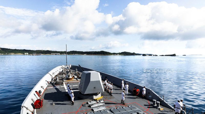 HMAS Hobart enters the port of Okinawa, Japan, during a regional presence deployment. Story by Lieutenant Brendan Trembath. Photo by Leading Seaman Daniel Goodman.