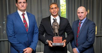 Hassett Award recipient Corporal Joshua Green, centre, with Lieutenant Colonel Christopher Johnson, left, and Warrant Officer Class One Anthony Jones. Story and photo by Private Nicholas Marquis.