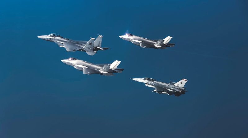 RAAF F-35A Lightning II and RSAF, F-16 Fighting Falcon and F-15SG Strike Eagle aircraft above Singapore. Story by Flight Lieutenant Bronwyn Marchant.