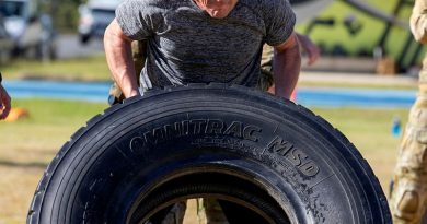 RAAF and Queensland police conduct a tyre flip during a training session at RAAF Base Amberley. Story by Flying Officer Greg Hinks. Photos by Corporal Kieren Whiteley.