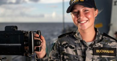 Seaman Boatswains Mate Kelsey Buchanan stands at the 12.7mm machine gun on board HMAS Anzac. Story by Lieutenant Amy Johnson. Photo by Leading Seaman Jarryd Capper.