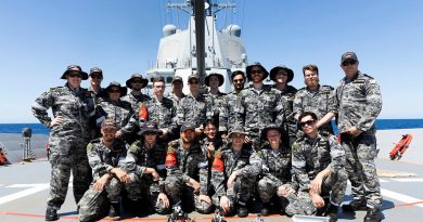 Electronic technicians on board HMAS Hobart on completion of the robot war competition. Story by Lieutenant Brendan Trembath. Photo by Leading Seaman Daniel Goodman.