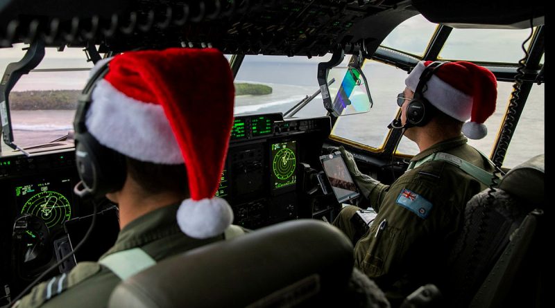 Pilots from 37 Squadron fly over the community of Mokil in Micronesia prior to dropping humanitarian aid stores. Story by Squadron Leader Eamon Hamilton. Photo by Corporal Kieren Whiteley.