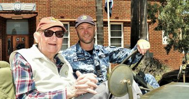 Flying Officer (retd) John 'Blue' Bailey, left, and Commanding Officer of 25 Squadron Wing Commander Paul Taylor pose in a world war jeep replica at RAAF Pearce. Story by Peta Magorian. Photo by Squadron Leader Roger Buddrige.