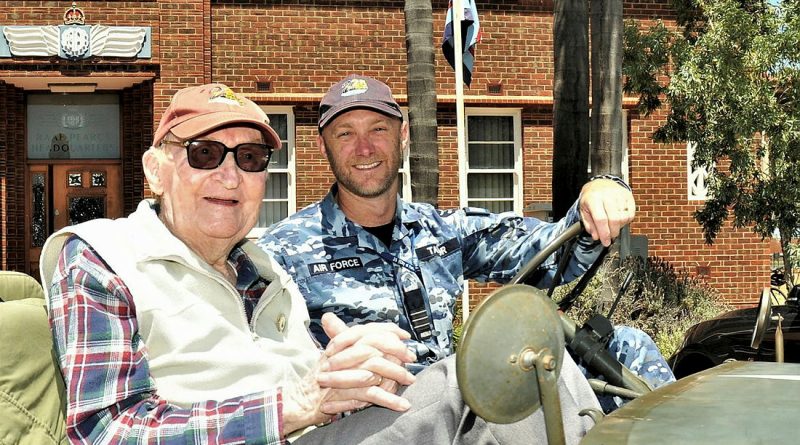 Flying Officer (retd) John 'Blue' Bailey, left, and Commanding Officer of 25 Squadron Wing Commander Paul Taylor pose in a world war jeep replica at RAAF Pearce. Story by Peta Magorian. Photo by Squadron Leader Roger Buddrige.