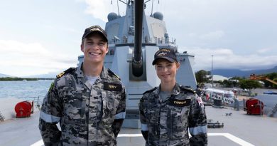 From left, Acting Sub-Lieutenant Lachlan Ferry and Able Seaman Combat Systems Operator Samantha Farrow on-board HMAS Hobart. Story by Lieutenant Brendan Trembath. Photo by Leading Seaman Daniel Goodman.