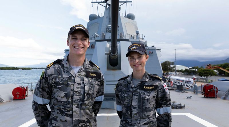 From left, Acting Sub-Lieutenant Lachlan Ferry and Able Seaman Combat Systems Operator Samantha Farrow on-board HMAS Hobart. Story by Lieutenant Brendan Trembath. Photo by Leading Seaman Daniel Goodman.