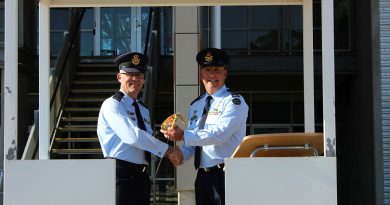 Outgoing Commander No 1 Recruit Training Unit Wing Commander Darren Dolan (left) transfers command of the unit to Wing Commander David Borg during a Transfer of Authority parade on December 2 at RAAF Base Wagga, NSW. Story by Squadron Leader Matt Kelly. Photo by Corporal Kristy Watson.