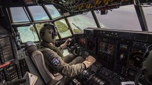 Flight Lieutenant Louise Michal-Paget flies over Etal Atoll, Chuuk, Micronesia, during Operation Christmas Drop 2022. Photo supplied by RNZAF.