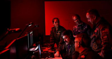 From left, RAAF Squadron Leader Katherine Wright, UN Navy Lieutenant Brady Martin, RAAF Corporal Hayley Davis, RAF Warrant Officer Graham Davis and US Navy Commander Pete Salvaggio take part in Exercise Resolute Hunter in Nevada, US. Story by Lieutenant Commander John Thompson. Photo by Lindsey Lauer.