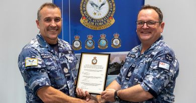 Surveillance and Response Group's Group Warrant Officer, Warrant Officer Scott Doring, right, hands over the reins to Warrant Officer Russell Beck during a ceremony at RAAF Base Williamtown. Story by Flight Lieutenant Claire Burnet. Photo by Leading Aircraftman Samuel Miller.