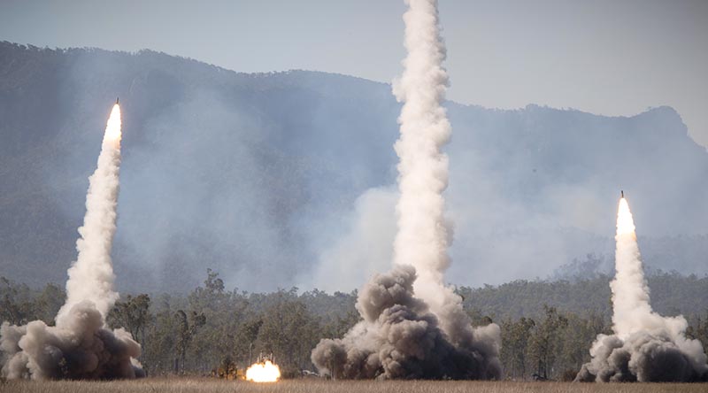 High Mobility Artillery Rocket Systems of the United States Army and United States Marine Corps launch rockets during a firepower demonstration at Shoalwater Bay Training Area in Queensland, during Talisman Sabre 2021. Photo by Corporal Madhur Chitnis.