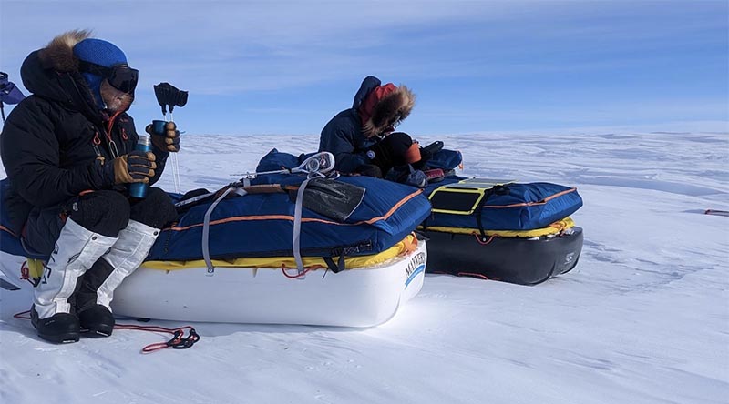 The Spirit Lives Antarctic Expedition team members scan a bleak but beautiful landscape on their way to the South Pole. Photo supplied.