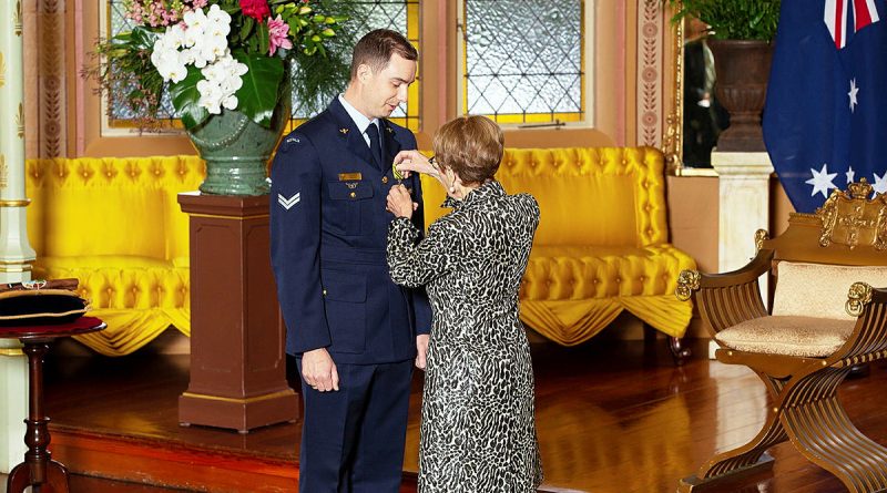 Corporal Joe Kelly receives his Conspicuous Service Cross from Governor of New South Wales, Margaret Beazley. Story and photo by Flight Lieutenant Julia Ravell.