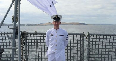 Petty Officer Adam O'Brien stands on the flight deck as HMAS Arunta pulls into Hobart ahead of the 185th Royal Hobart Regatta. Story and photo by Sub-Lieutenant Tahlia Merigan.