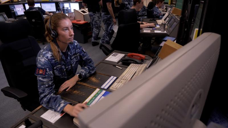 Flight Lieutenant Brittany Knowles in her role as air traffic controller in Darwin. Story by John Noble.