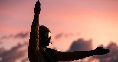 Leading Seaman Aviation Technician Aircraft Julijan Pavin marshals personnel as HMAS Hobart’s embarked MH-60R helicopter conducts deck landing practice while transiting through the Indonesian Archipelago during a Regional Presence Deployment. Photo by Leading Seaman Daniel Goodman.