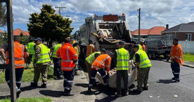 New Zealand Defence Force personnel help local authorities to clean up flood-damaged household good ahead of forecast Cyclone Gabrielle. NZDF photo.