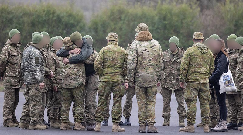 Australian Army soldiers from the 5th Battalion, Royal Australian Regiment, farewell newly graduated Ukrainian soldiers they helped train in the UK. Photo by Corporal Jonathan Goedhart.