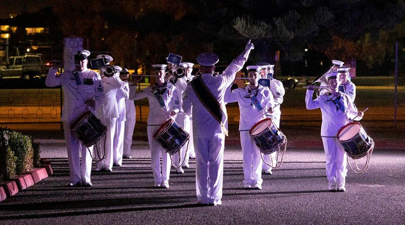 Members of the Royal Australian Navy Band - WA prepare to retire from the ceremonial sunset in celebration of Navy Week at Leeuwin Barracks, WA. Story by By Sub-Lieutenant Connor Cusack. Photo by Leading Seaman Julia Rickards.