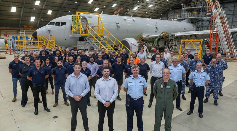 Members of the first P-8A Poseidon Depot Maintenance at RAAF Base Edinburgh including front second from left, Boeing Defence Australia P-8A Program Manager, David Kleinitz, and front right, Officer Commanding 92 Wing, Group Captain Paul Carpenter. Photo by Corporal Brenton Kwaterski.
