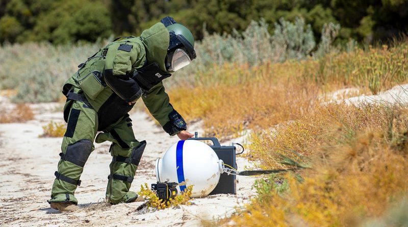 A Navy clearance diver conducts a suspected unexploded ordnance exercise as part of the team’s deployment workups at HMAS Stirling, Western Australia. Story by Lieutenant Commander Will Singer. Photo by Leading Seaman Ernesto Sanchez.
