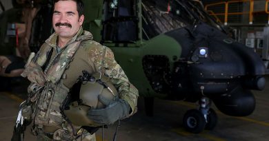 Aircrewman Sergeant Damien Collison-Bryant stands in front of an MRH-90 Taipan at the Australian Army Aviation Training Centre, Swartz Barracks, Queensland. Story by Carolyn Barnett. Photo by Brad Richardson.