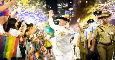 Defence LGBTI Information Service President Lieutenant Rachel Cosgrove takes part in the 2023 Gay and Lesbian Mardi Gras Parade on Oxford Street, Sydney. Story and photo by Private Nicholas Marquis.