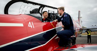 Major Eun-Ho Yang from the Republic of Korea Air Force aerobatic team The Black Eagles sits in a Pilatus PC-21 from the Royal Australian Air Force aerobatic team The Roulettes while Flight Lieutenant Ben Hepworth shows him the cockpit after a Friendship flight as part of the Australian International Air Show 2023. Photo by Leading Aircraftwoman Kate Czerny.