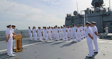 HMAS Perth III crew gathered on the flight deck to commemorate the losses of Perth I and USS Houston in 1942. Story by Lieutenant Commander Matthew Paes. Photo courtesy HMAS Perth III.