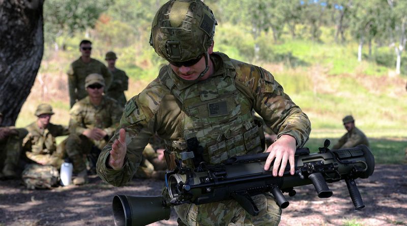 Private Jack Sewell, of Direct First Support Weapons Platoon, demonstrates a one-man reload of the 84mm Carl Gustav recoilless rifle. Story and photo by Warrant Officer – Class 2 Max Bree.