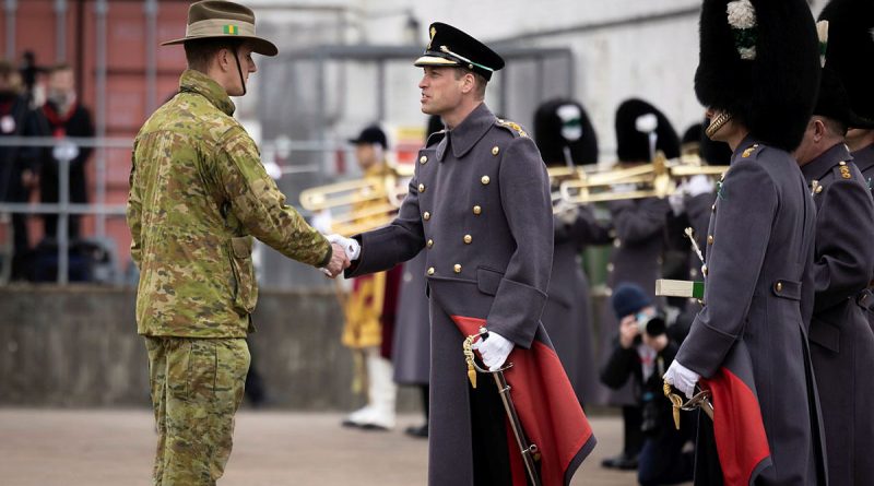 Prince William presents a leek to a soldier from the 5th Battalion, Royal Australian Regiment, during St David's Day celebrations in Windsor, UK. Story by Captain Annie Richardson. Photo by Corporal Jonathan Goedhart.