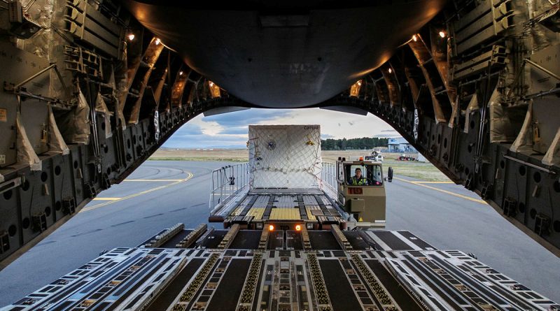 Leading Aircraftwoman Emma Nearmy removes Australian Antarctic Division cargo from a C-17A Globemaster III at Hobart International Airport, Tasmania. Story by Captain Karam Louli. Photos by Corporal Lisa Sherman.