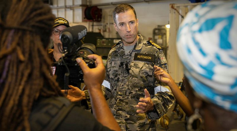 Commanding Officer HMAS Canberra Captain Jace Hutchison speaks with Vanuatu media during Operation Vanuatu Assist 2023. Photo by Leading Seaman Matthew Lyall.