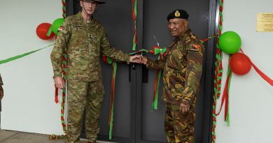 Australia's Chief of Defence Force General Angus Campbell, left, and Commander of the Papua New Guinea Defence Force Major General Mark Goina, cut the ribbon to refurbished soldiers accommodation at Taurama Barracks, Papua New Guinea. Story by Captain Joanne Leca. Photo by Corporal Brandon Grey.