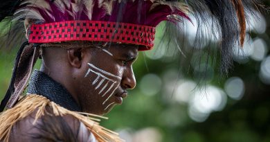 An Australian Army soldier from Sarpeye Company, 51FNQR in traditional Torres Strait Islander clothing for the 80th anniversary ceremony. Story by Captain Jon Stewart. All photos by Leading Seaman Leo Baumgartner.