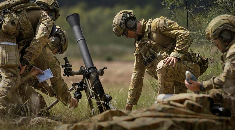 Soldiers from the 9th Regiment, Royal Australian Artillery, prepare to fire an 81mm mortar during Exercise Waratah Run in Singleton. Story and all photos by Corporal Jacob Joseph.