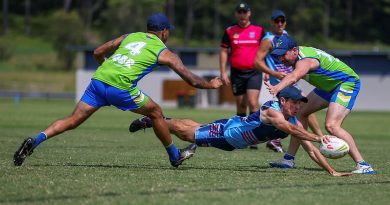 Flight Lieutenant David Murray splits the defence in a desperate dive for the line against ACT Raiders. Story by Squadron Leader Pete Croce.